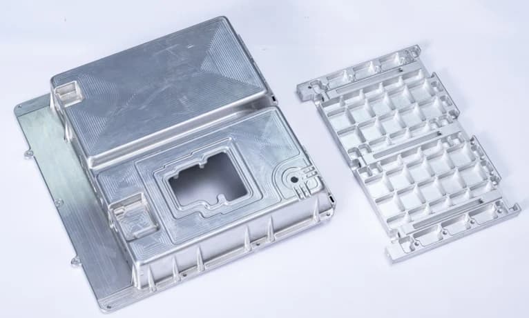 Aluminum battery housing components with pockets, ribs and mounting holes