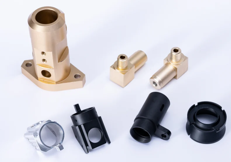 Yiwei machined housings, rings and threaded components photographed on a light background
